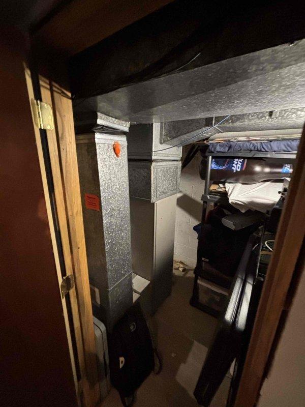 Provided comprehensive estimate for replacement of 40-year-old natural gas furnace and air conditioning system located in basement mechanical room. Existing HVAC equipment currently operational but nearing end of service life. Assessment included evaluation of existing ductwork, electrical panel capacity, and spatial requirements for new high-efficiency equipment installation per BOGO promotion specifications.