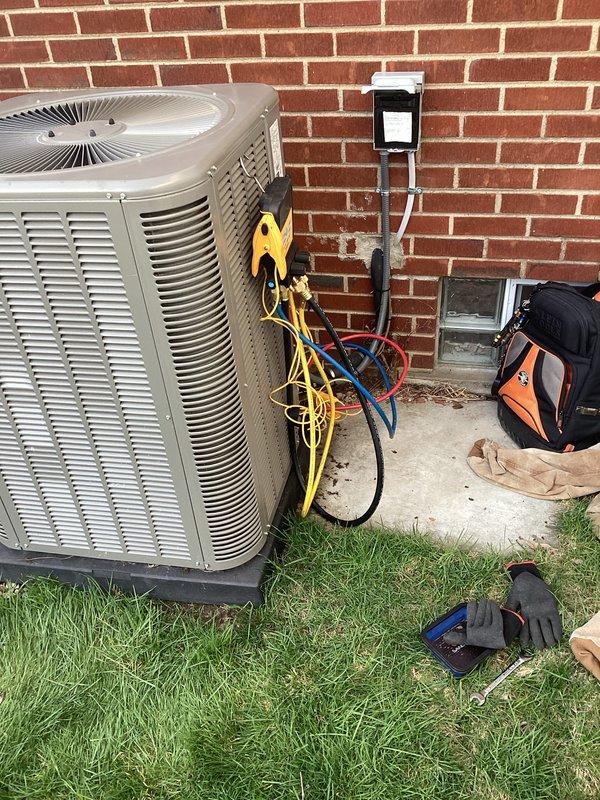 Performed routine Air Care Maintenance on Lennox outdoor condensing unit. Connected manifold gauges to verify refrigerant pressures and system performance, inspected electrical disconnect, and confirmed proper operation of all components. Unit found in good working condition with no issues identified during this preventive maintenance visit.