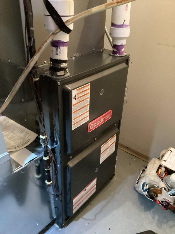Completed contractual tune-up on five-year-old Goodman forced air furnace and air conditioning system. Performed comprehensive inspection of both units, including electrical connections, gas lines, refrigerant levels, and venting systems. Verified all components operating within manufacturer specifications with no deficiencies noted. Both heating and cooling systems functioning properly at time of service completion.