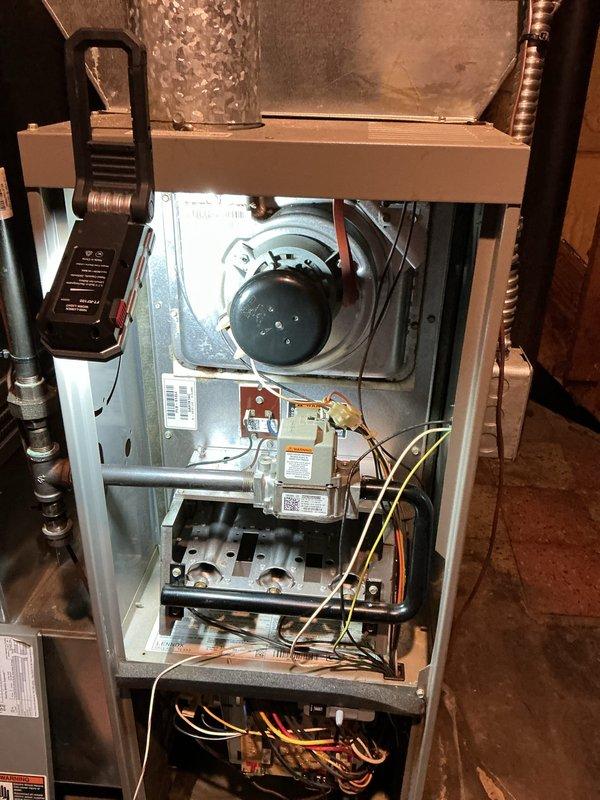 Completed annual furnace maintenance and tune-up on residential HVAC system. Performed comprehensive inspection of blower motor assembly, control board, electrical connections, and refrigerant lines. All components found operating within normal parameters with no issues identified; system confirmed functioning properly prior to service call.