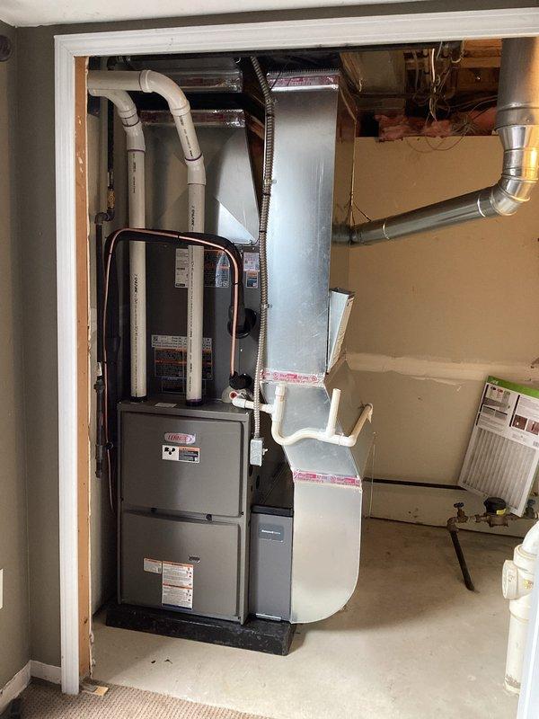 Completed full HVAC system installation including a 90,000 BTU furnace and 2.5 ton air conditioning unit with rear discharge configuration. Secured all required mechanical and electrical permits prior to installation. Installed new furnace on platform base with proper venting using PVC piping, connected condensate drainage system with flexible corrugated hose, and mounted air handler with metal plenum and flexible aluminum ductwork. Reconnected all electrical and mechanical components to existing systems, verified proper airflow and unit operation, and completed final system testing to ensure optimal performance.