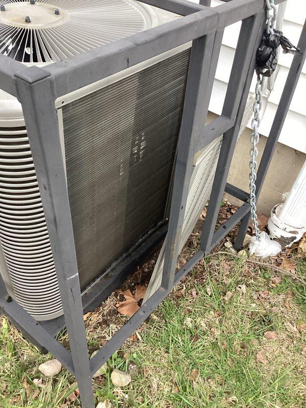 Completed scheduled Air Care Cooling maintenance on outdoor condensing unit. Upon arrival, found extensive dirt and debris accumulation on condenser coils and significant organic matter buildup at unit base. Performed thorough coil cleaning to restore proper heat transfer efficiency, removed leaves and debris from unit perimeter and base, and verified all components operational following maintenance procedures.
