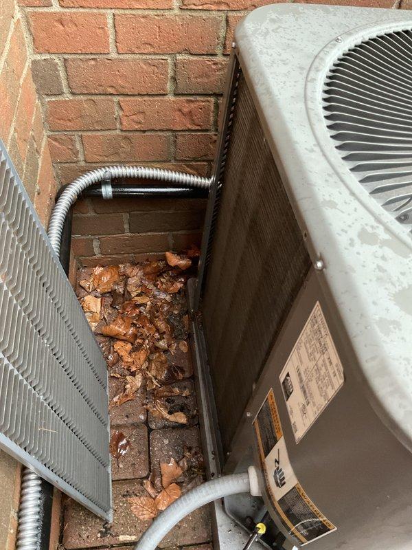 Completed annual cooling maintenance on outdoor HVAC system. Cleared debris and accumulated leaves from around both units, inspected refrigerant lines and electrical conduit connections, and replaced air filters and evaporative cooler pads as requested. System tested and operating within normal parameters.