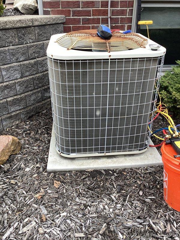 Completed annual cooling maintenance on residential air conditioning system. Performed comprehensive inspection of outdoor condenser unit, checked refrigerant levels, cleaned condenser coils, verified electrical connections at disconnect box, and tested system operation to ensure proper cooling performance for the upcoming season.