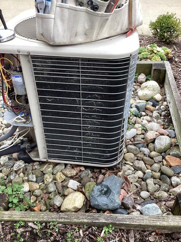 Completed scheduled air conditioning maintenance on residential split system unit. Performed comprehensive inspection with unit access panel removed to evaluate internal components, copper refrigerant lines, electrical connections, and mechanical assemblies. Utilized digital manifold gauge set to measure system pressures and temperatures, recording low-side pressure at 103.9 psi and high-side pressure at 264.7 psi on R410A refrigerant system. Verified superheat at 43.1°F and subcooling at 77.4°F, confirming proper refrigerant charge and system performance within manufacturer specifications. All components operating normally with no deficiencies noted.
