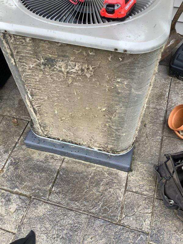 Completed routine air conditioning maintenance visit on residential condenser unit. Upon arrival, found exterior coils heavily contaminated with dirt, dust, and debris buildup that was significantly restricting airflow and reducing system efficiency. Performed thorough coil cleaning to remove compacted material from aluminum fins and exterior surfaces. Inspected fan assembly and mechanical components for proper operation. Restored unit to optimal operating condition with improved airflow through condenser coils.