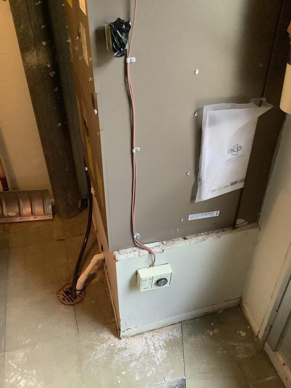 Responded to callback for HVAC installation to address improperly secured unit disconnect. The disconnect box mounting hardware was oversized for the wall connector opening, creating a gap that compromised secure attachment to the structure. Corrected the installation by properly securing the disconnect cover to the wall connector using appropriately sized mounting hardware, ensuring code-compliant electrical safety and stable equipment mounting.
