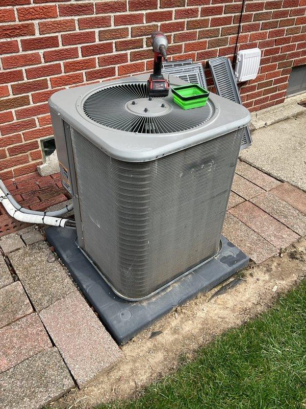 Completed annual preventative maintenance on residential split system air conditioning unit. Performed comprehensive inspection of outdoor condensing unit including cleaning of condenser coils, verification of refrigerant levels, electrical connection testing, and operational assessment of compressor and condenser fan motor. All components found to be functioning within normal parameters with no deficiencies noted.