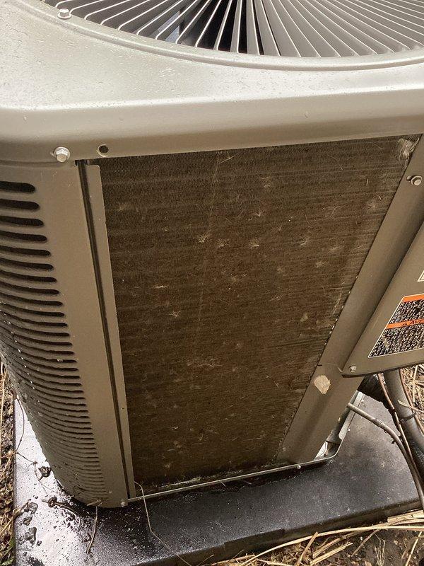 Completed comprehensive Air Care Maintenance on two HVAC systems, performing heating and cooling service protocols. Replaced two air filters and one humidifier pad as requested. Inspected humidifier operation and verified proper drainage function with no issues found. Cleaned heavily soiled condenser coil on outdoor unit which showed significant dirt and debris accumulation restricting airflow. Inspected condensing unit components, fan operation, and refrigerant lines. All systems tested and operating within normal parameters upon completion.