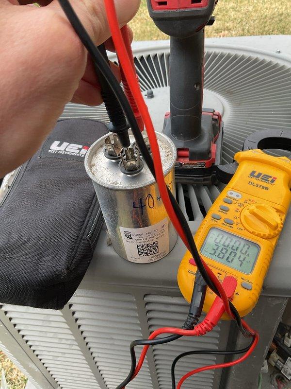 Completed annual cooling maintenance on rooftop package unit. Performed system diagnostics using refrigerant manifold gauges, recording operating pressures, temperatures, superheat, and subcooling values to verify proper refrigerant charge and system performance. Tested capacitor with digital multimeter, confirming electrical specifications within acceptable range. All components operating normally with no deficiencies noted.