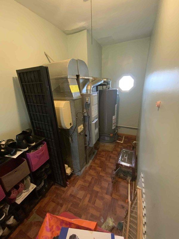 Conducted full system estimate for residential property currently without air conditioning and equipped with a 16-year-old furnace. Assessed existing HVAC infrastructure in utility room, evaluating current furnace condition, ductwork configuration, and available space for new AC unit installation. Documented equipment layout, electrical service capacity, and mechanical room dimensions to determine optimal equipment sizing and placement for complete system replacement or AC addition with potential furnace upgrade.