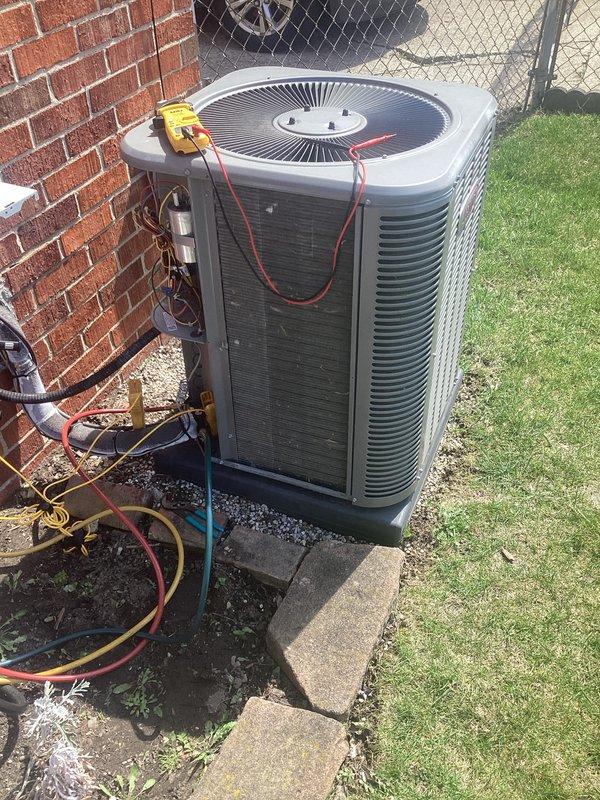 Completed annual cooling maintenance on residential air conditioning system. Performed diagnostic testing on outdoor condenser unit using electrical test meters to verify proper operation and electrical values. Cleaned exterior panels and louvers on AC unit as requested, inspected filter, and ensured all components were functioning within normal parameters for optimal system performance.