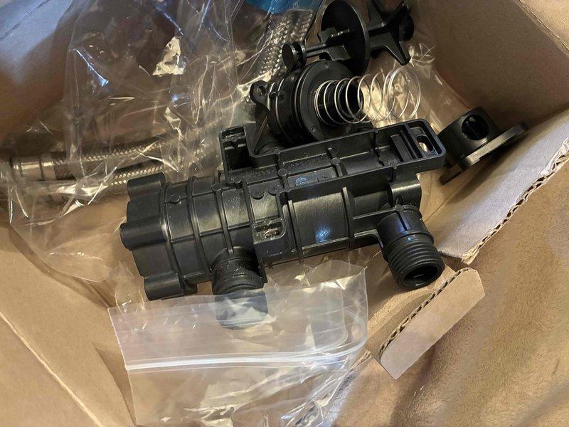 Responded to warranty recall for noise complaint on recently installed tankless water heater. Diagnosed plunking noise originating from unit as faulty flow sensor assembly. Replaced defective flow sensor component under parts and labor warranty, resolving the issue.