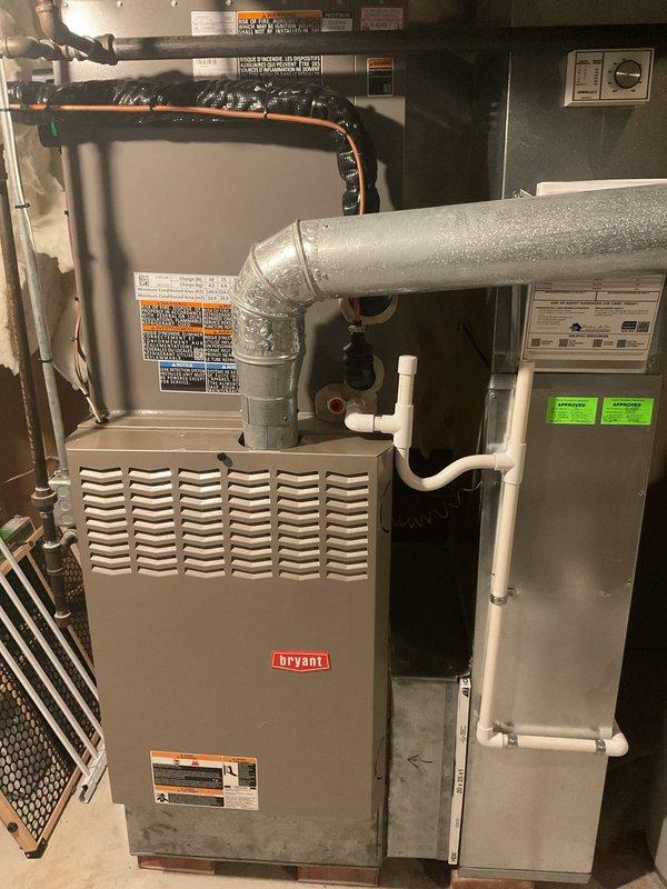 Completed comprehensive Air Care Heating and Cooling maintenance on Bryant furnace system with integrated air handler. Performed thorough inspection of all internal components including draft inducer motor, ignition control board, burner assembly, and electrical connections. Verified proper operation of heating and cooling systems, checked refrigerant lines, condensate drainage system, and all safety controls. All components found operating within manufacturer specifications, system tested and confirmed ready for continued service.