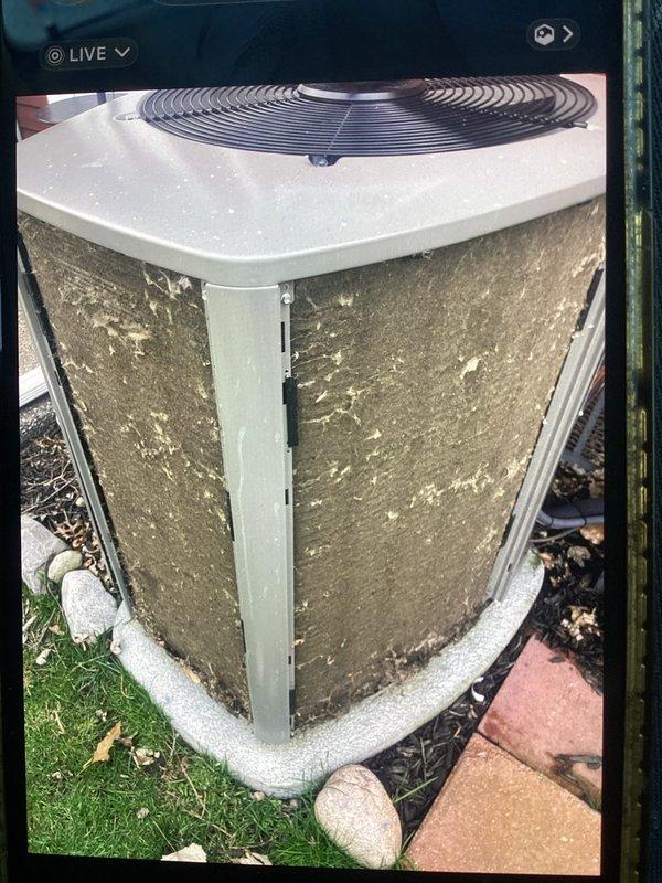 # HVAC Maintenance - ACM Service Completed

Performed routine Air Care Maintenance on residential outdoor condensing unit. Upon arrival, conducted comprehensive visual inspection of equipment exterior, noting weathered cabinet panels with typical dirt accumulation and aging consistent with normal outdoor exposure. Unit positioned on concrete pad with adequate clearance for airflow.

Completed standard ACM protocol including:

- Inspected condenser coil panels through protective grilles for debris accumulation
- Verified fan guard integrity and proper mounting
- Examined unit foundation and concrete pad for levelness and stability
- Assessed surrounding area for vegetation encroachment or drainage concerns
- Checked cabinet panels for corrosion, damage, or loose fasteners
- Documented equipment condition through photographic records

Unit operational with no immediate service concerns identified during maintenance inspection. All protective components including fan guard and cabinet pan