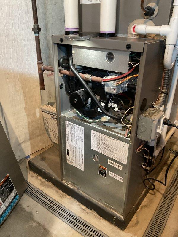 Completed annual heating and cooling maintenance on residential HVAC system. Performed comprehensive inspection of furnace unit, accessing internal components including blower motor assembly, electrical connections, and control wiring. Verified proper operation of all safety controls and mechanical components. Utilized Fieldpiece SMAN refrigerant manifold gauge to measure and record system pressures and temperatures on cooling equipment, confirming refrigerant charge levels and system performance within manufacturer specifications. All equipment found operating normally with no deficiencies noted.