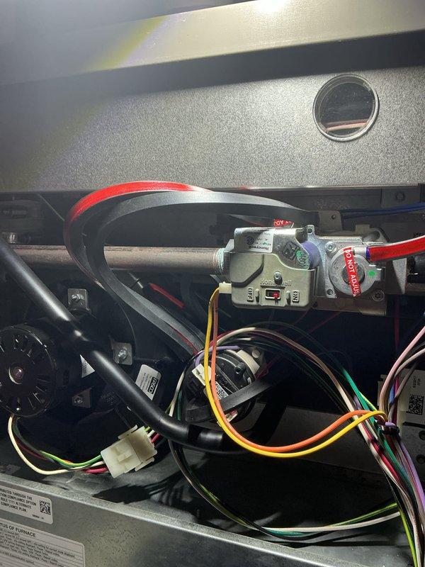 Completed annual maintenance on both heating and cooling systems. Inspected furnace internal components including gas valve assembly, electrical connections, and control mechanisms. All wiring connections were secure with proper routing observed. Checked outdoor condensing unit and noted significant deterioration of foam insulation panels with visible cracks, chips, and weathering requiring future attention. Verified unit operation and confirmed both systems are functioning properly at this time.