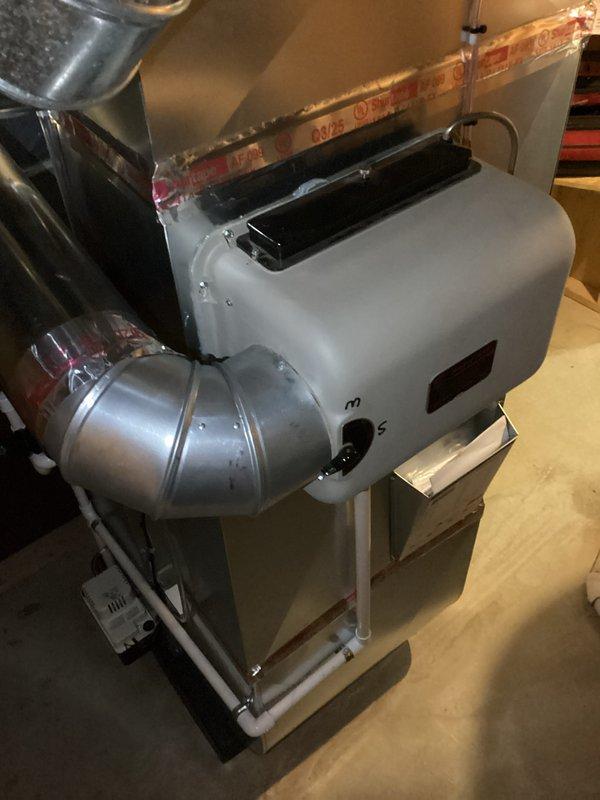 Completed full HVAC system installation including a 90,000 BTU furnace and 3-ton air conditioning unit with rear discharge configuration. Installed air handler on wooden platform in mechanical space with proper condensate drainage via PVC piping and metallic duct connections. Ran galvanized ductwork vertically through living space with branch connections to distribution system, securing all components to structural joists and beams. Completed electrical reconnection and obtained mechanical and electrical permits prior to installation. System tested and operational upon completion.