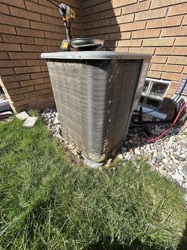 Completed annual cooling maintenance on residential air conditioning system. Performed comprehensive inspection of outdoor condenser unit, checked refrigerant levels, cleaned coils, tested electrical components with multimeter, and verified proper system operation. Unit found to be operating within normal parameters with no issues identified.