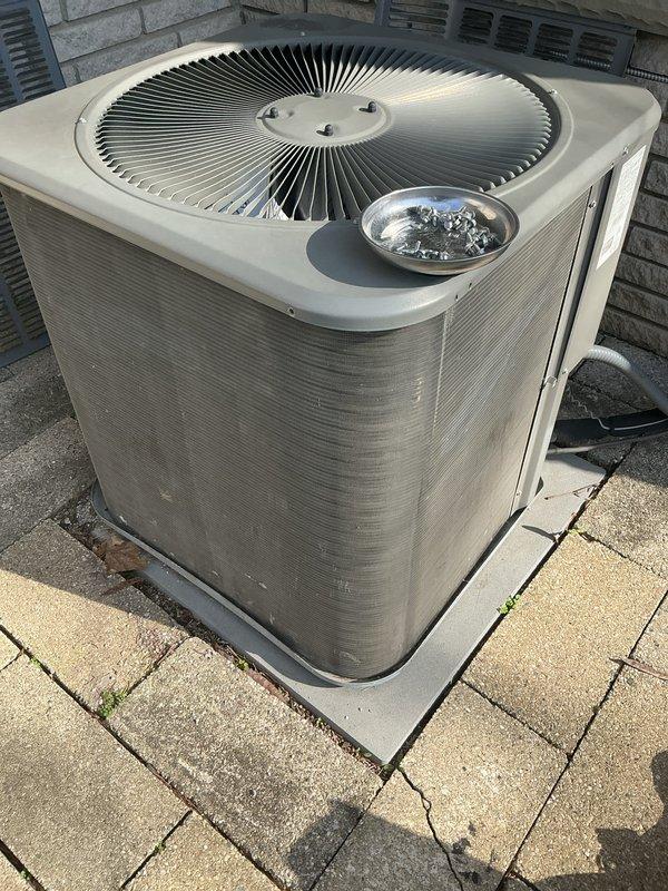 Completed comprehensive AC tune-up maintenance on residential outdoor condensing unit. Performed full system inspection, electrical diagnostics with multimeter to verify proper voltage and amperage at compressor connections, cleaned condenser coils, checked refrigerant levels, and tested fan motor operation. Unit operating within manufacturer specifications with no issues identified.