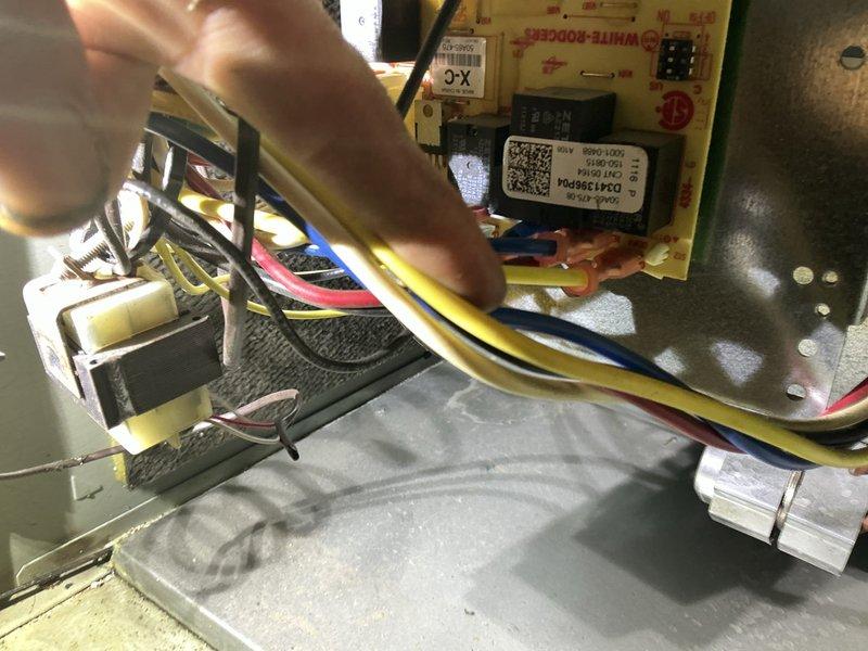 Responded to no heat call on 11-year-old furnace in basement blowing cold air only. Upon inspection, diagnosed failed control board with visible component damage affecting heating operation. Accessed control board assembly, disconnected power and wiring connections, removed failed board from metal enclosure, and installed replacement control board. Reconnected all low-voltage and line-voltage wiring to proper terminals, verified secure connections at terminal blocks, and restored power to unit. Tested system operation through complete heating cycle, confirmed ignition sequence, burner operation, and proper heat output. Unit now heating normally with all safety controls functioning as designed.