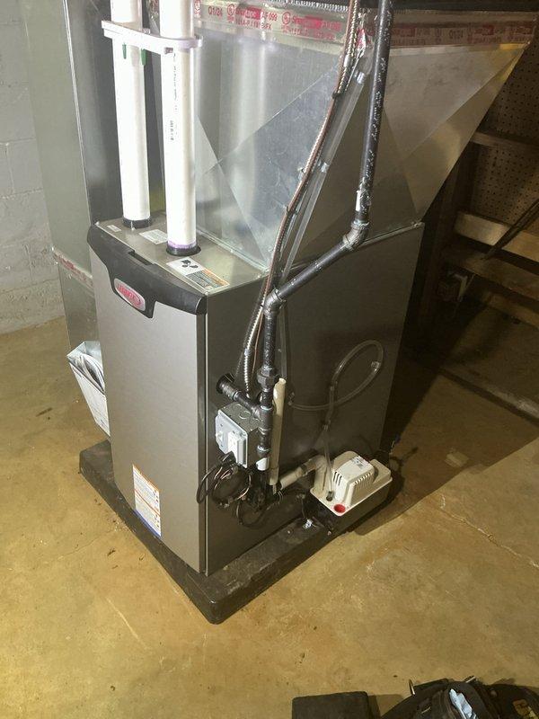 Completed scheduled Air Handler Maintenance (AHM) on residential HVAC furnace system. Performed comprehensive inspection of unit components including blower assembly, heat exchanger, condensate pump, and intake/exhaust venting system. Verified proper operation of all mechanical components, checked electrical connections and grounding, inspected ductwork and insulation integrity, and confirmed condensate drainage functionality. Unit found to be in good working condition with no deficiencies noted.