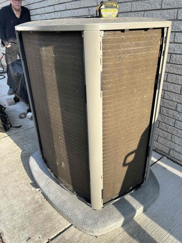 Completed one-year complimentary maintenance inspection on Lennox air conditioning system. Performed comprehensive AC tune-up on less than one-year-old unit, including inspection of outdoor condensing unit, verification of proper system operation, and documentation of equipment condition. Unit found operating properly with no deficiencies noted; exterior surfaces showed normal environmental exposure and debris accumulation on protective grilles.