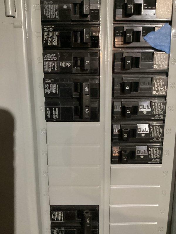 Completed full HVAC system installation including 110,000 BTU gas furnace and 4-ton air conditioning unit with rear discharge configuration in basement utility area. Installed white PVC venting system with proper termination and elbowing, reconnected electrical service at main panel with appropriate circuit breaker installation, and verified all mechanical and electrical connections per code requirements. All permits obtained and system tested for proper operation upon completion.