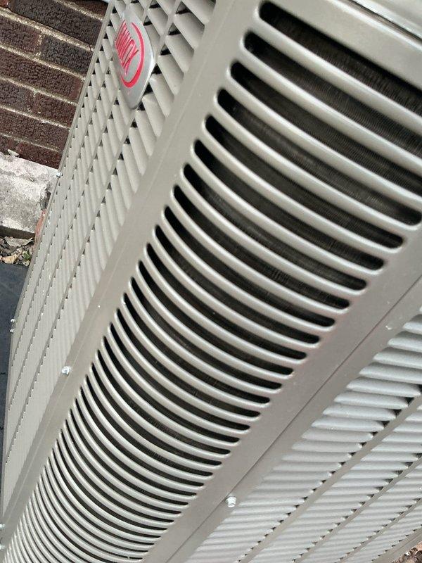 Completed complimentary annual heating maintenance and tune-up on residential furnace system per membership agreement. Performed comprehensive inspection of HVAC equipment including outdoor unit and indoor climate control system. All components operating within normal parameters with no issues identified. Thermostat displaying proper readings with room temperature at 71°F, set point at 74°F, and humidity at 37%. Outdoor unit found in clean, well-maintained condition with no visible signs of wear, damage, or deterioration. System ready for heating season operation.