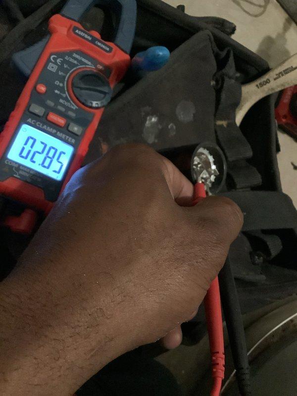 Completed routine maintenance and tune-up on a 7-year-old forced air furnace system. Performed comprehensive system diagnostics using digital multimeter to verify electrical performance and measure amp draw on blower motor, confirming readings within normal operating parameters at 0.285 amps. Inspected internal components including burner assembly, heat exchanger, ignition system, and blower motor. Checked all electrical connections, wire harnesses, and control board for proper operation and secure mounting. Verified gas valve operation and flame sensor functionality. System tested and confirmed operational with no issues identified requiring immediate repair.
