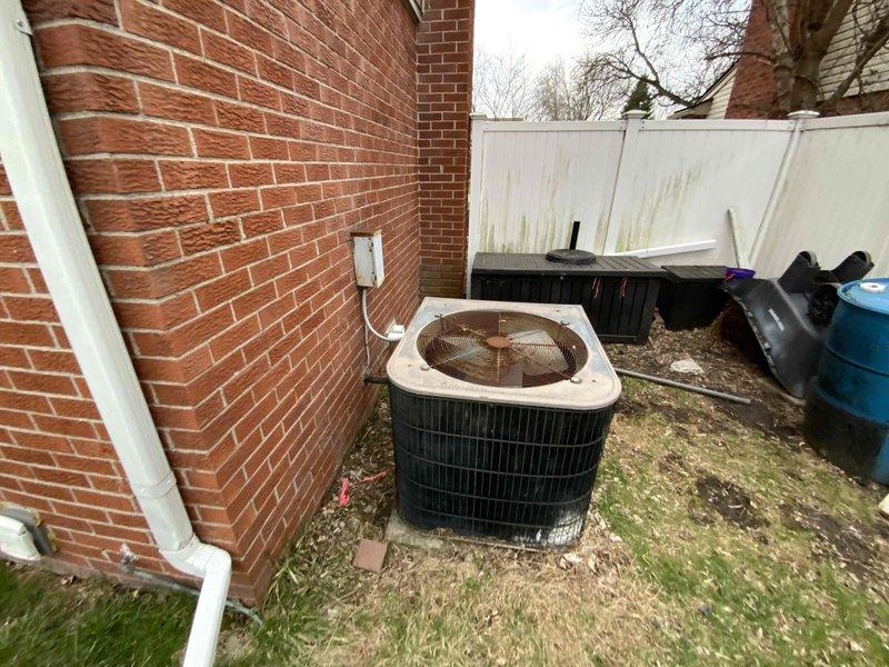 Provided comprehensive estimate for complete HVAC system replacement including furnace and air conditioning unit for 41-year-old equipment currently located in basement. Existing system remains operational but has exceeded typical service life expectancy. Assessment included evaluation of outdoor condensing unit positioned in side yard area and basement-installed furnace with associated ductwork and electrical components.