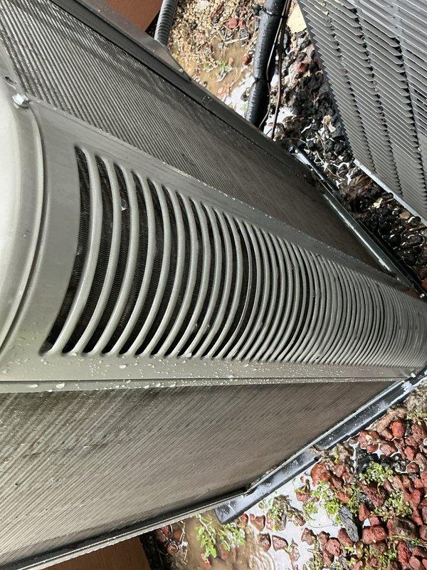 Performed scheduled preventive maintenance on outdoor air conditioning unit. Inspected condenser coil and found moderate accumulation of dust, debris, and seasonal leaf matter on fins and surrounding areas. Cleaned exterior surfaces, removed organic debris from unit perimeter, and verified proper airflow through heat exchanger components to ensure optimal system performance for upcoming cooling season.