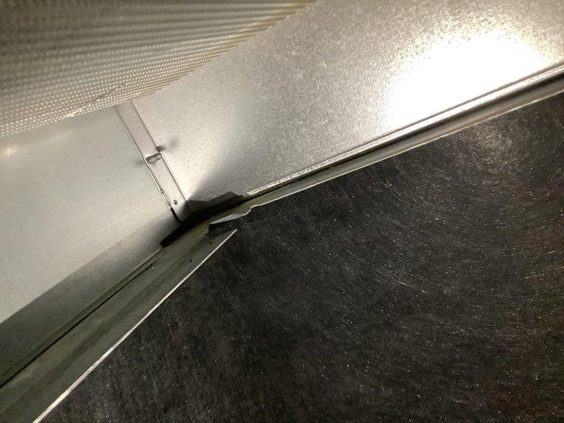 Responded to service call for 4-year-old furnace leaking water under warranty coverage. Upon inspection, identified water staining on ductwork and adjacent piping near floor level, indicating active condensate leak. Traced source to condensate drain system, cleared blockage in drain line, and verified proper drainage flow. Inspected heat exchanger and secondary heat exchanger for cracks or failures, confirmed integrity intact. Tested condensate pump operation and adjusted drain pan positioning to ensure proper water collection and discharge. System restored to normal operation with no further leakage observed during run cycle testing.