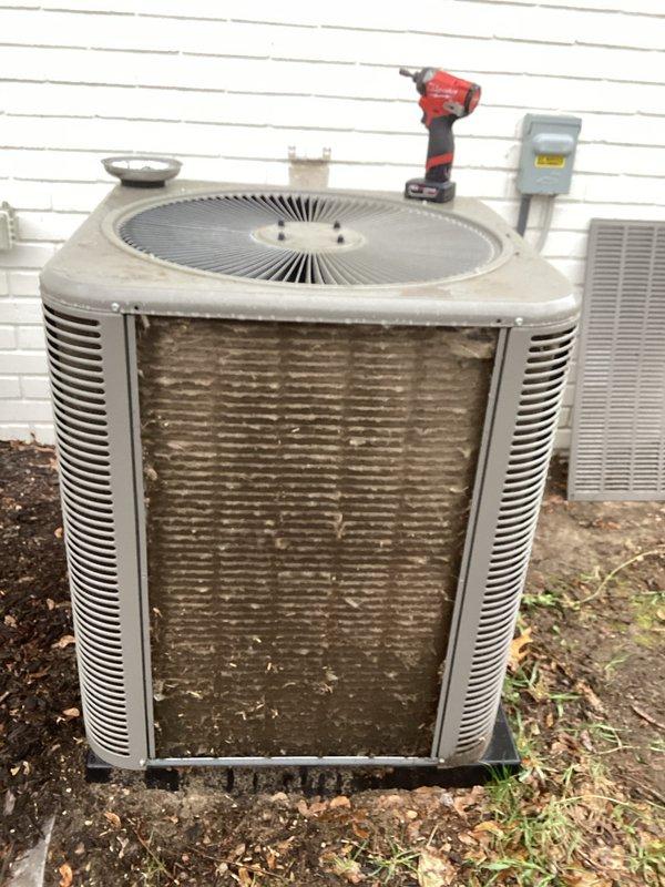 Completed scheduled Air Care Maintenance on residential air conditioning system. Performed comprehensive inspection of outdoor condenser unit, which showed significant dirt and grime accumulation on coils and exterior surfaces. Cleaned condenser coils, removed debris from unit base and surrounding area, and verified proper fan operation and electrical connections at disconnect box.