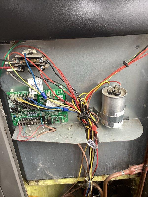 Completed routine air conditioning maintenance on residential split system. Performed comprehensive inspection of outdoor condensing unit and indoor air handler components. Verified proper operation of control board, run capacitor, and all electrical connections within the unit. Inspected low-voltage and line-voltage wiring for secure terminations and proper routing. Checked refrigerant lines and connections for integrity. Removed and replaced air filter as part of standard maintenance protocol. All system components found to be in good working condition with no deficiencies noted.