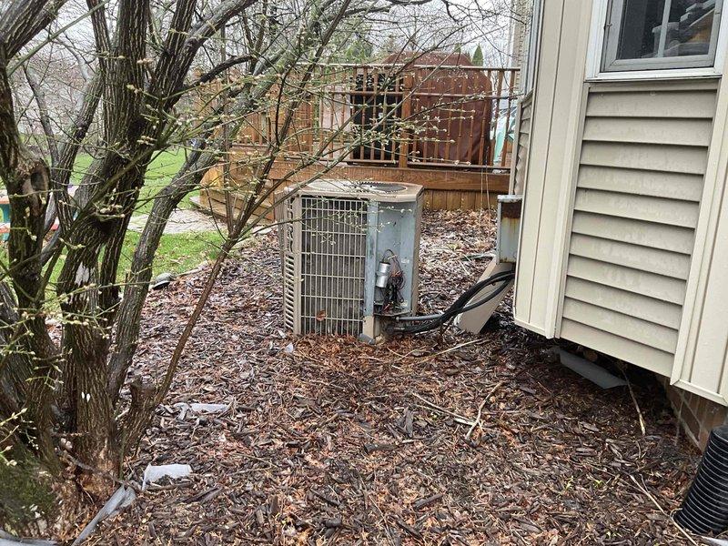 Provided comprehensive estimate for complete HVAC system replacement including outdoor air conditioning unit and natural gas furnace located in basement. Existing 30-year-old equipment still operational but well beyond expected service life, with visible weathering on outdoor condenser unit and aging basement-installed furnace. Documented current system configuration, assessed installation requirements, and presented replacement options including potential promotional package for simultaneous AC and furnace upgrade.