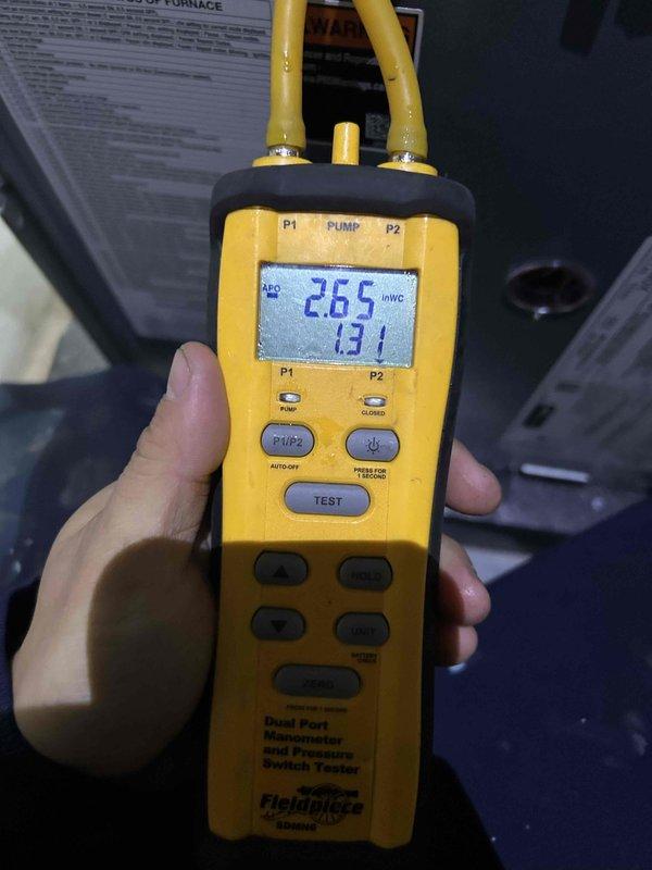 Performed comprehensive annual heating checkup on gas furnace system as part of white glove maintenance service. Conducted electrical diagnostics using digital multimeter to verify proper voltage and amperage at gas valve assembly and control board, and utilized dual-port manometer to measure static pressure readings (26.5 INWC recorded) to ensure optimal airflow and system performance. Inspected burner assembly, heat exchanger, and all electrical connections; provided complimentary air filter replacement and confirmed all components operating within manufacturer specifications.