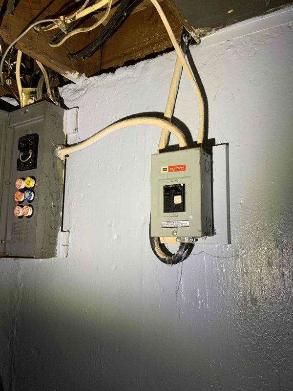 Completed comprehensive estimate for full HVAC system replacement at residential property. Evaluated existing 10+ year old furnace for replacement and assessed requirements for new central air conditioning installation where no AC system currently exists. Inspected electrical infrastructure including main panel with multiple circuit breakers and disconnect box, verified adequate electrical capacity and conduit routing for new equipment installation. Documented existing furnace unit condition and photographed electrical panel configuration to determine compatibility with proposed high-efficiency heating and cooling system. Provided specifications and recommendations for complete furnace and air conditioning system replacement to meet homeowner's desired timeline for installation within couple weeks.