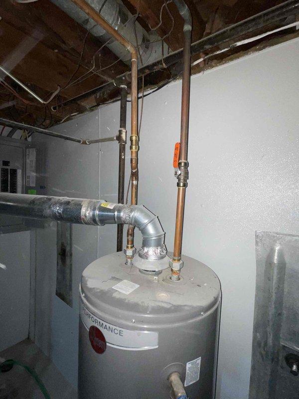 Conducted comprehensive full system estimate for residential HVAC replacement. Evaluated existing 16-year-old air conditioning unit that failed last season and 15-year-old low-efficiency furnace, both requiring replacement due to age and performance issues. Assessed basement mechanical room layout, existing ductwork configuration, and utility connections including gas, electrical, and condensate drainage. Documented current water heater installation and discussed potential replacement options as part of overall home comfort system upgrade. Photographed existing equipment, piping arrangements, and installation area to develop accurate replacement proposal for complete heating and cooling system suited to customer's timeline of replacement within the next couple weeks.