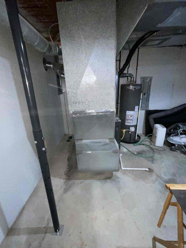 Conducted comprehensive full system estimate for residential HVAC replacement. Evaluated existing 16-year-old air conditioning unit that failed last season and 15-year-old low-efficiency furnace, both requiring replacement due to age and performance issues. Assessed basement mechanical room layout, existing ductwork configuration, and utility connections including gas, electrical, and condensate drainage. Documented current water heater installation and discussed potential replacement options as part of overall home comfort system upgrade. Photographed existing equipment, piping arrangements, and installation area to develop accurate replacement proposal for complete heating and cooling system suited to customer's timeline of replacement within the next couple weeks.