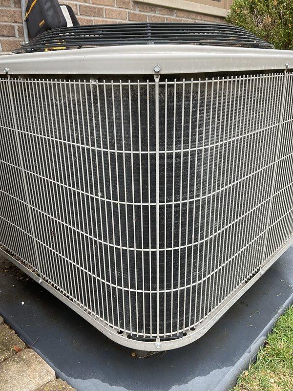 Completed annual cooling maintenance on residential outdoor condensing unit. Performed comprehensive system inspection, replaced air filter and evaporative pad, cleaned condenser coils, verified proper airflow through vertical fin assembly, and confirmed operational status of fan motor and compressor. Unit tested and operating within normal parameters with no deficiencies noted.