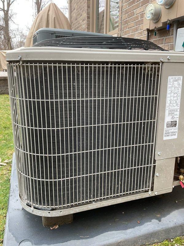 Completed annual cooling maintenance on residential outdoor condensing unit. Performed comprehensive system inspection, replaced air filter and evaporative pad, cleaned condenser coils, verified proper airflow through vertical fin assembly, and confirmed operational status of fan motor and compressor. Unit tested and operating within normal parameters with no deficiencies noted.