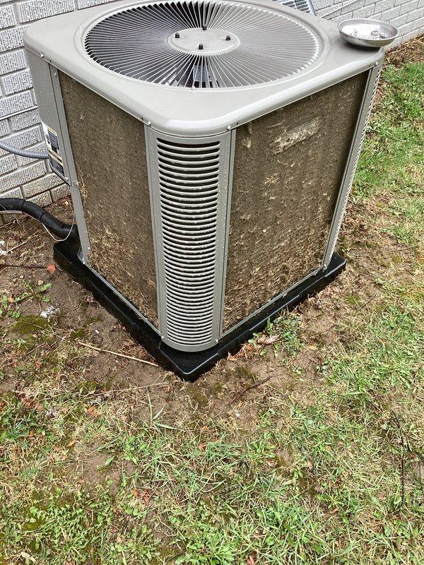 Completed comprehensive HVAC maintenance service including air care heating and cooling system inspection. Replaced furnace filter and humidifier pad as scheduled. Performed thorough inspection of outdoor condenser unit, which showed significant exterior weathering and dirt accumulation on cabinet panels and louvers. Verified unit operational status, confirmed fan operation, and checked refrigerant lines and electrical connections. System tested and operating within normal parameters upon completion of maintenance tasks.