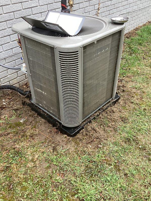 Completed comprehensive HVAC maintenance service including air care heating and cooling system inspection. Replaced furnace filter and humidifier pad as scheduled. Performed thorough inspection of outdoor condenser unit, which showed significant exterior weathering and dirt accumulation on cabinet panels and louvers. Verified unit operational status, confirmed fan operation, and checked refrigerant lines and electrical connections. System tested and operating within normal parameters upon completion of maintenance tasks.