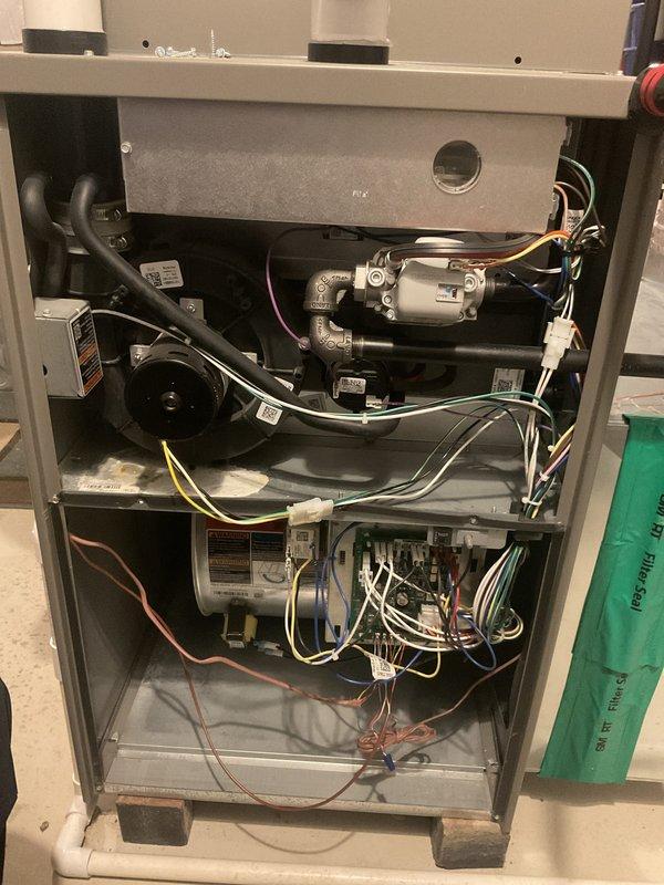 Completed recurring preventive maintenance service on residential air handler and heating unit. Performed comprehensive system inspection with front panel access to evaluate internal components including blower motor assembly, gas valve, burner assembly, and ignition system. Conducted electrical diagnostics using digital multimeter to verify proper amperage readings and system operation. Inspected all wiring connections, ductwork connections, and mechanical components for wear or deterioration. Documented equipment condition through photographic records. All systems tested and confirmed operational within manufacturer specifications. Unit returned to normal service.