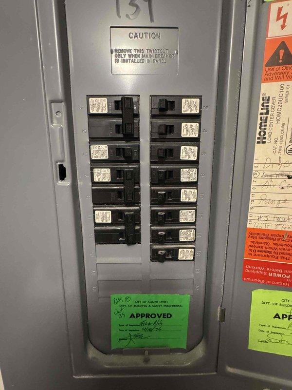 Conducted in-home estimate for replacement of 20+ year old Carrier air conditioning system. Assessed existing HVAC ductwork showing significant deterioration with flaking and peeling of outer metallic coating, documented duct dimensions, and evaluated flexible ductwork connections in mechanical space. Inspected electrical panel with Homeline breakers to verify adequate electrical capacity for new system installation, noting current panel configuration and recent inspection approval dated February 2026. Photographed equipment conditions and electrical infrastructure to provide comprehensive replacement recommendations for system upgrade scheduled within the next month.