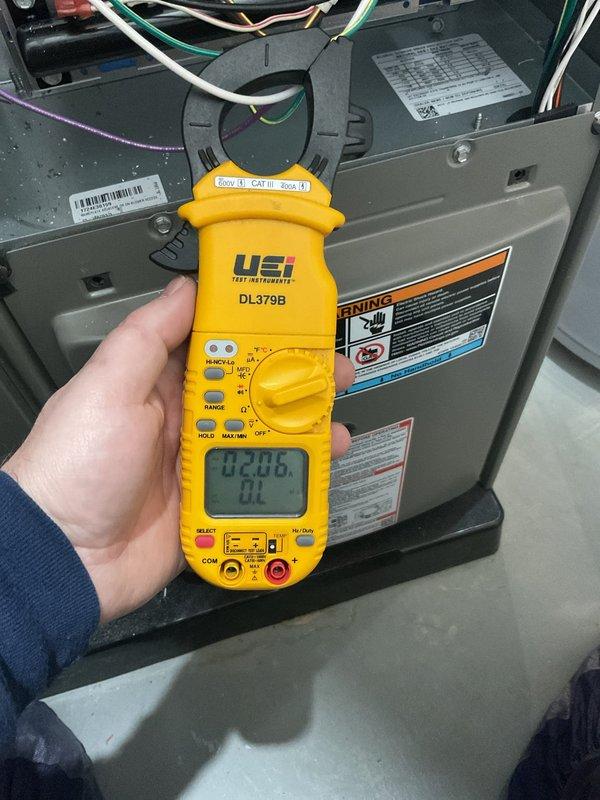 Completed annual furnace maintenance and tune-up on 10-year-old unit with no reported issues. Performed comprehensive system diagnostics using digital clamp meter to verify electrical performance, measuring amperage draw on blower motor and other electrical components to ensure proper operation within manufacturer specifications. Inspected all internal components, wiring connections, and safety controls, confirming system is operating efficiently and safely for continued use.