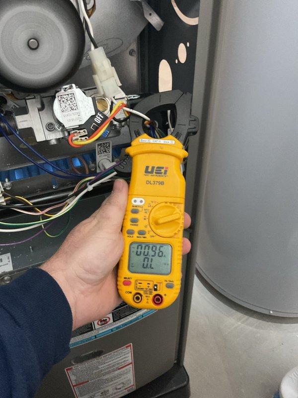 Completed annual furnace maintenance and tune-up on 10-year-old unit with no reported issues. Performed comprehensive system diagnostics using digital clamp meter to verify electrical performance, measuring amperage draw on blower motor and other electrical components to ensure proper operation within manufacturer specifications. Inspected all internal components, wiring connections, and safety controls, confirming system is operating efficiently and safely for continued use.