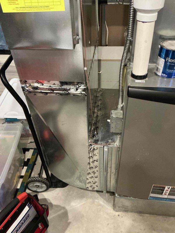 Completed full system estimate for residential HVAC replacement. Inspected existing 10-year-old air conditioning system including indoor furnace unit with visible cabinet damage and exposed insulation, and outdoor condenser unit with refrigerant line sets, electrical disconnect, and condensate drain. Documented current system configuration, photographed equipment condition, and provided comprehensive replacement options for customer requiring immediate system replacement.