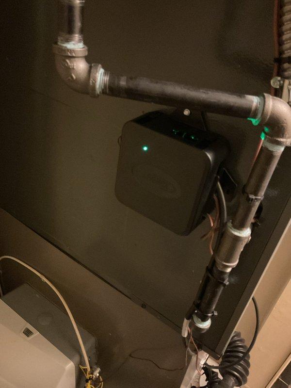 Successfully completed installation of a 3.5-ton air conditioning system with evaporator coil in rear configuration. Installed new copper refrigerant line set with proper insulation, mounted condensate pump with electronic controls featuring indicator lights, and connected all necessary ductwork and drainage components. Reconnected electrical service, verified proper system operation, and ensured all mechanical and refrigeration connections met code requirements as permits were previously requested.